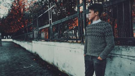 Man Wearing Gray and Black Sweater