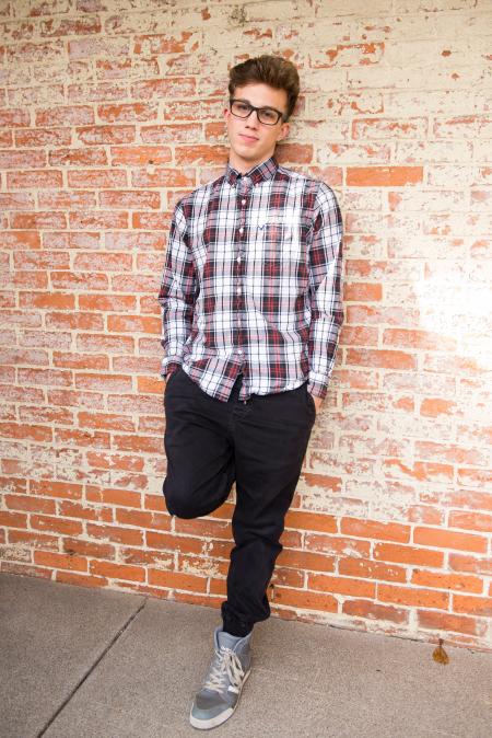 Man Wearing Red And White Plaid Dress Shirt And Black Pants