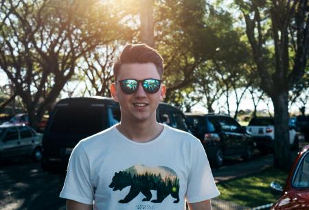 Man Wearing White and Black Bear Printed Shirt and Sunglasses