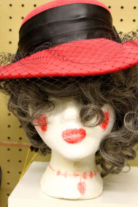 Mannequin in red hat