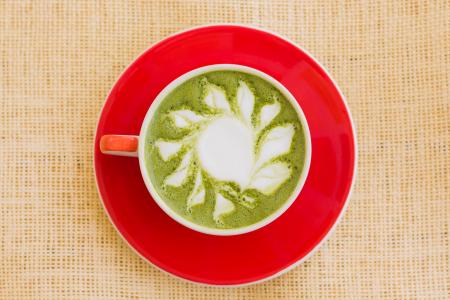 Matcha Drink on Red Ceramic Bowl