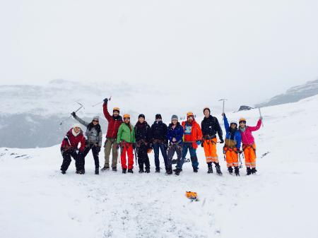 Men and Women at the Mountain Covered With Snow