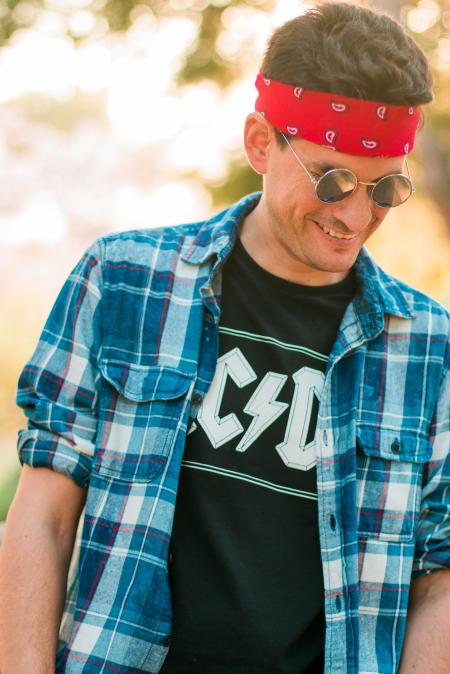 Men's Wearing Black Crew Neck Shirt While Smiling