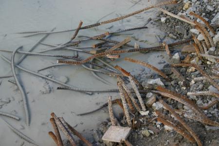 Metal bars in water