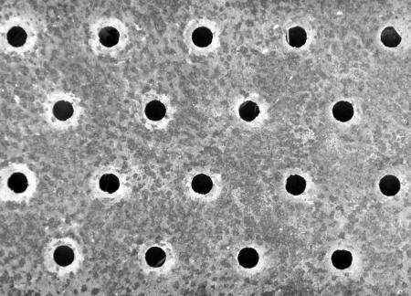 Metal Holes Rusted Background