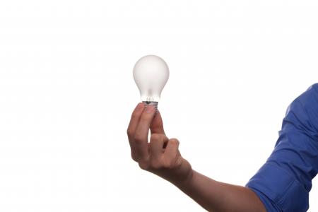 Midsection of Man Holding Hands over White Background