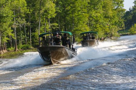 Military Ships in the River