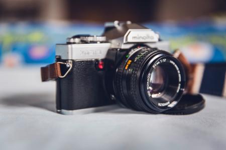 Minolta Grey and Black Mcla on Grey Table