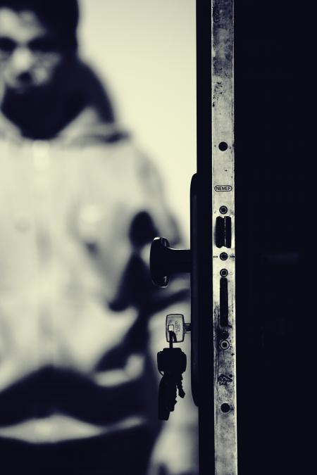 Monochrome Photo of Keys and Door Knob