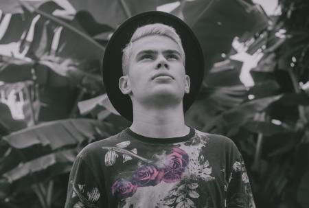 Monochrome Photography of Man Wearing Hat