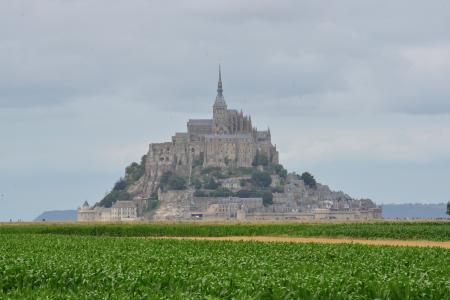 Mont Saint-michel Under White Clouds and Blue Sky