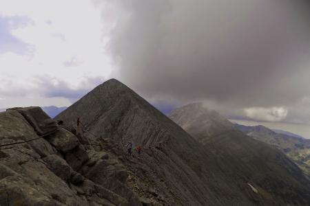 Mountain Range Under Grey Skies