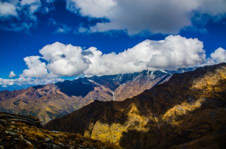 Mountains Under White Clouds