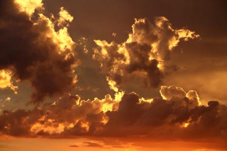 Nimbus Clouds on Clear Blue Sky during Golden Hour