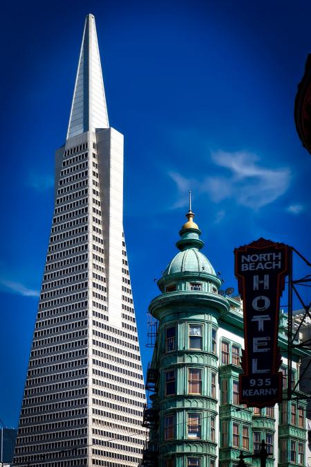 North Beach Hotel 935 Kearny Signage over the High Rise Tower Under Blue Sky