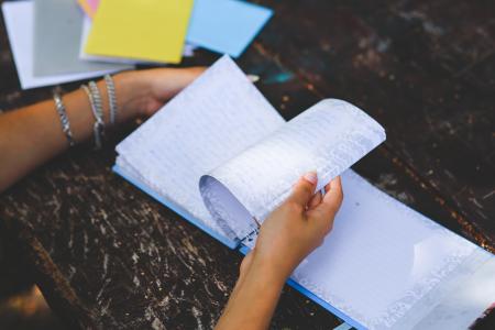 Notebook in hands