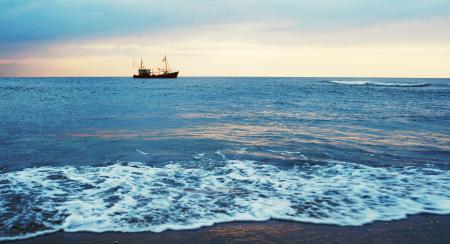 Ocean sunset with boat