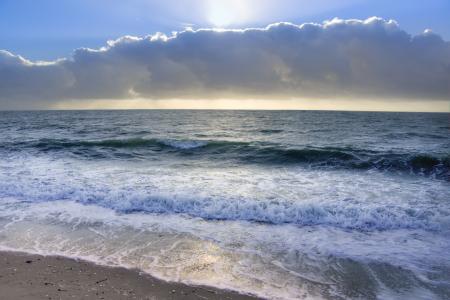 Ocean Under Blue Sky and White Clouds