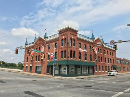 Office building/former automobile dealership, Howard Street and E. North Avenue, Baltimore, MD