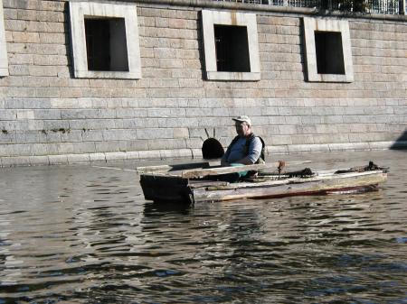 Old man on a boat