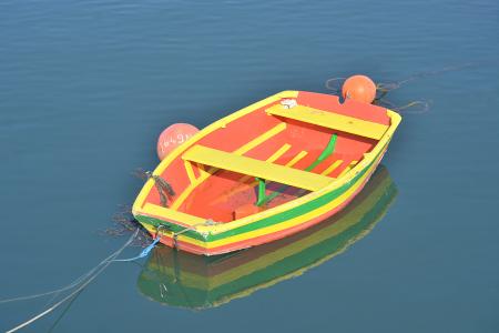 Orange and Yellow Rowing Boat