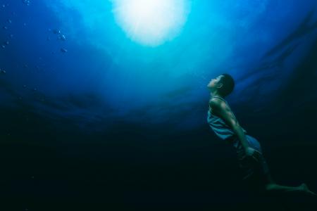 Painting of a Person Swimming Underwater