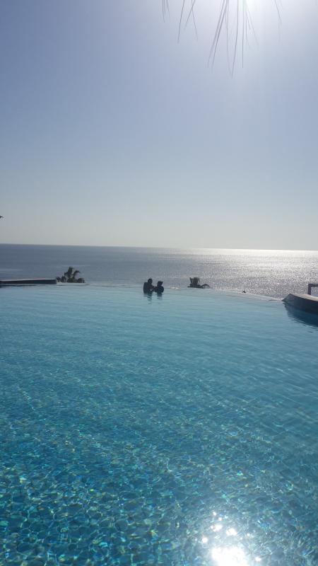 People in Blue Ocean Water during Daytime