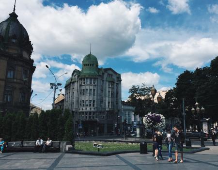 People in Front of Building