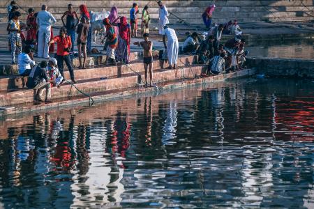 People Near Body Of Water