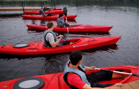 People Riding Kayaks