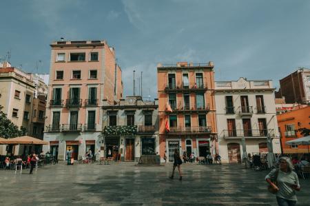 People Standing Near Concrete Buildings