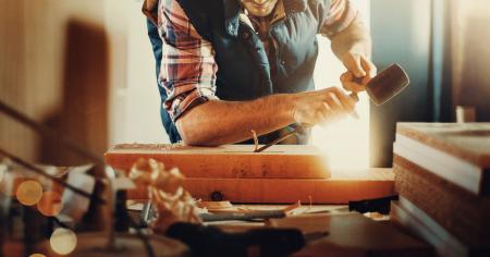 Person Curving Wood