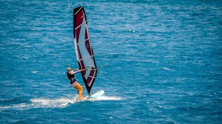 Person Doing Surfboarding