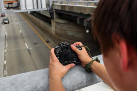 Person Holding Dslr Camera