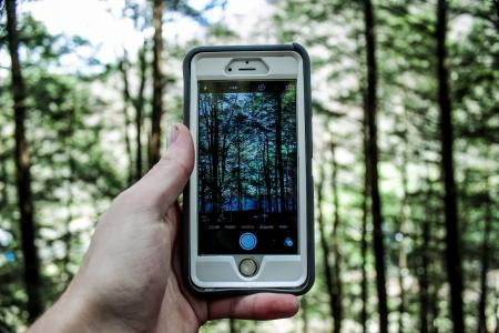 Person Holding Silver Iphone 6