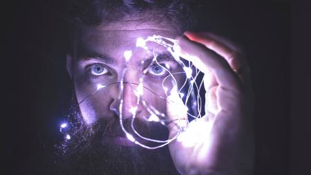 Person Holding String Lights Photo