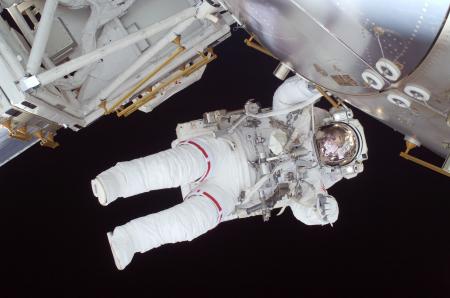 Person in White Astronaut Suit