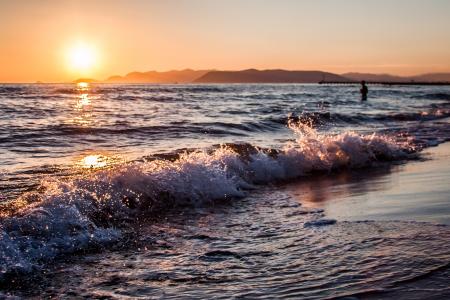 Person on Beach during Golden Hour