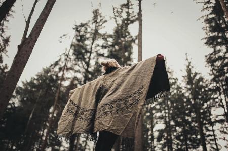 Person Spread Her Arms Wearing Gray Jacket