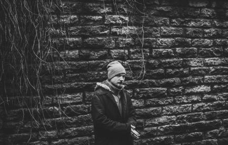 Person Standing Wearing Black Coat