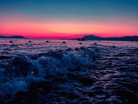 Person Taking Photo of Body of Water in Long Exposure Shot