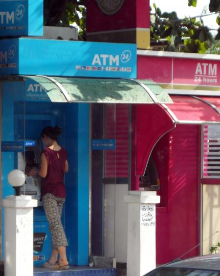 Person Using an ATM Machine