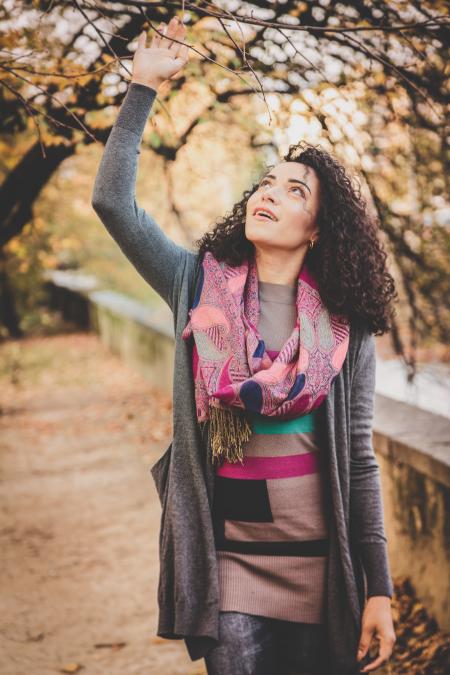 Person Wearing Gray Cardigan Looking Up