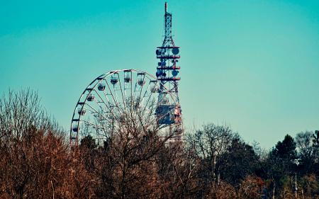 Photo of a Ferris Wheel Beside Tower