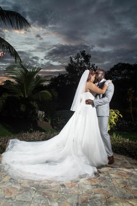 Photo of a Man Kissing His Wife