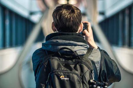 Photo of a Man Taking Pictures