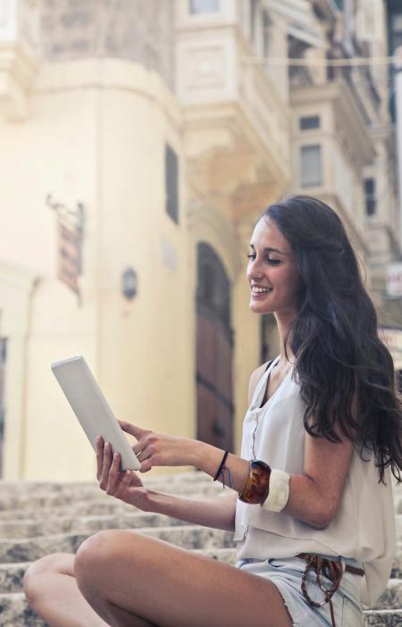 Photo of a Woman Sitting on Stairs
