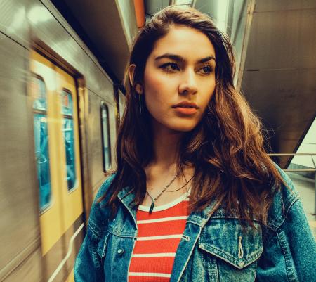 Photo of a Woman Wearing Blue Denim Jacket