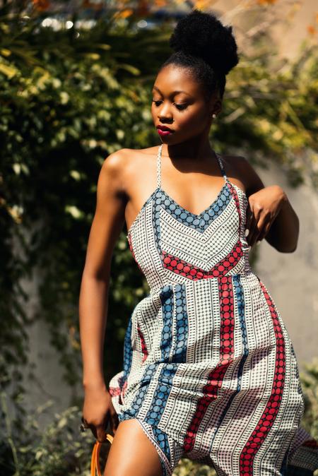 Photo of a Woman Wearing Spaghetti Strap Dress