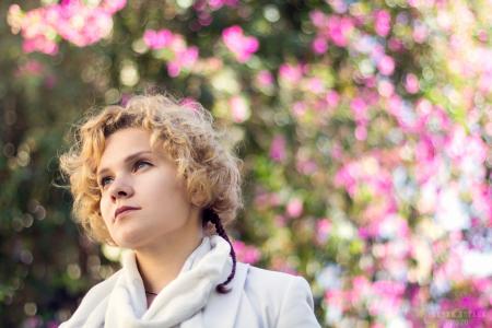 Photo of a Woman Wearing White Coat